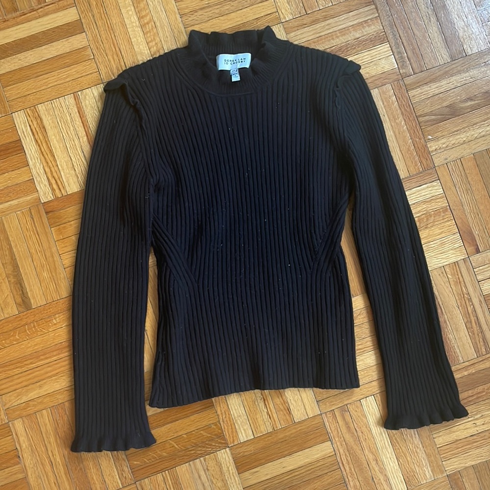 A gorgeous Derek Lam 10 Crosby black ruffled sweater